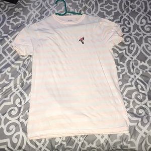 Peach and white T-shirt.